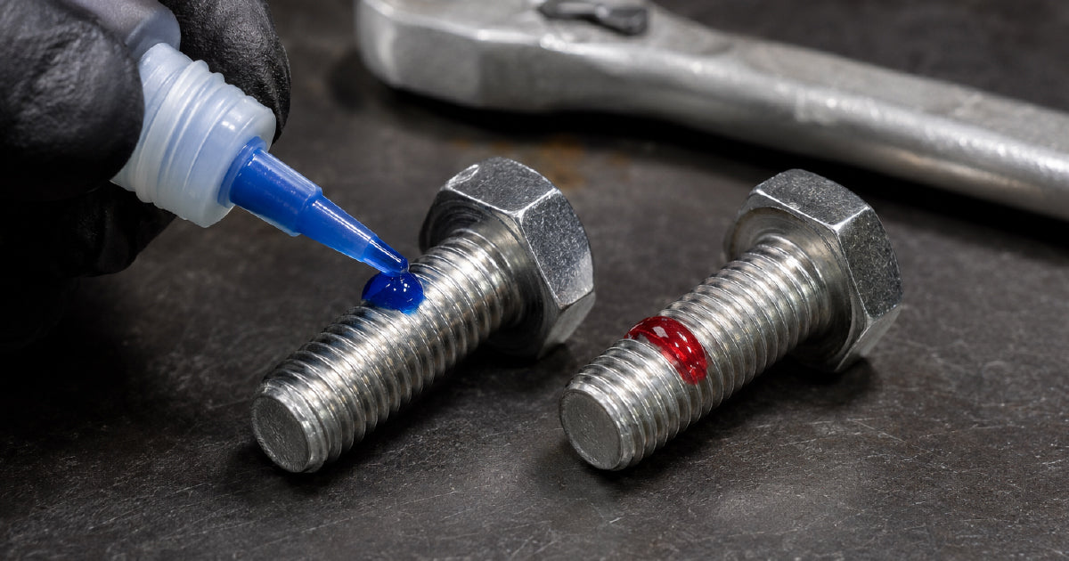 Applying blue Loctite threadlocker to a bolt thread