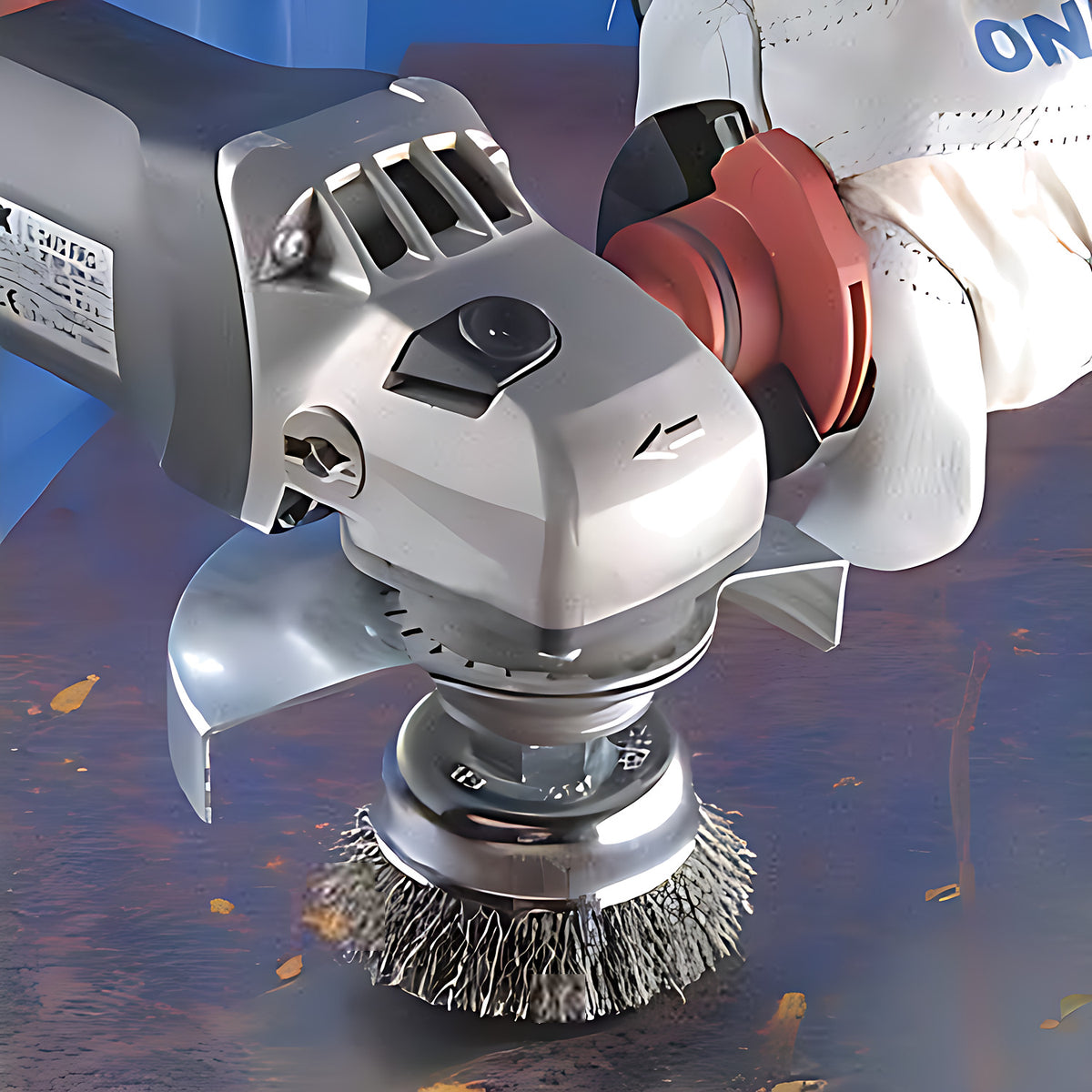 Pferd TBU crimped cup brush on an angle grinder, gloved operator cleaning rust off a steel plate, portrait working shot