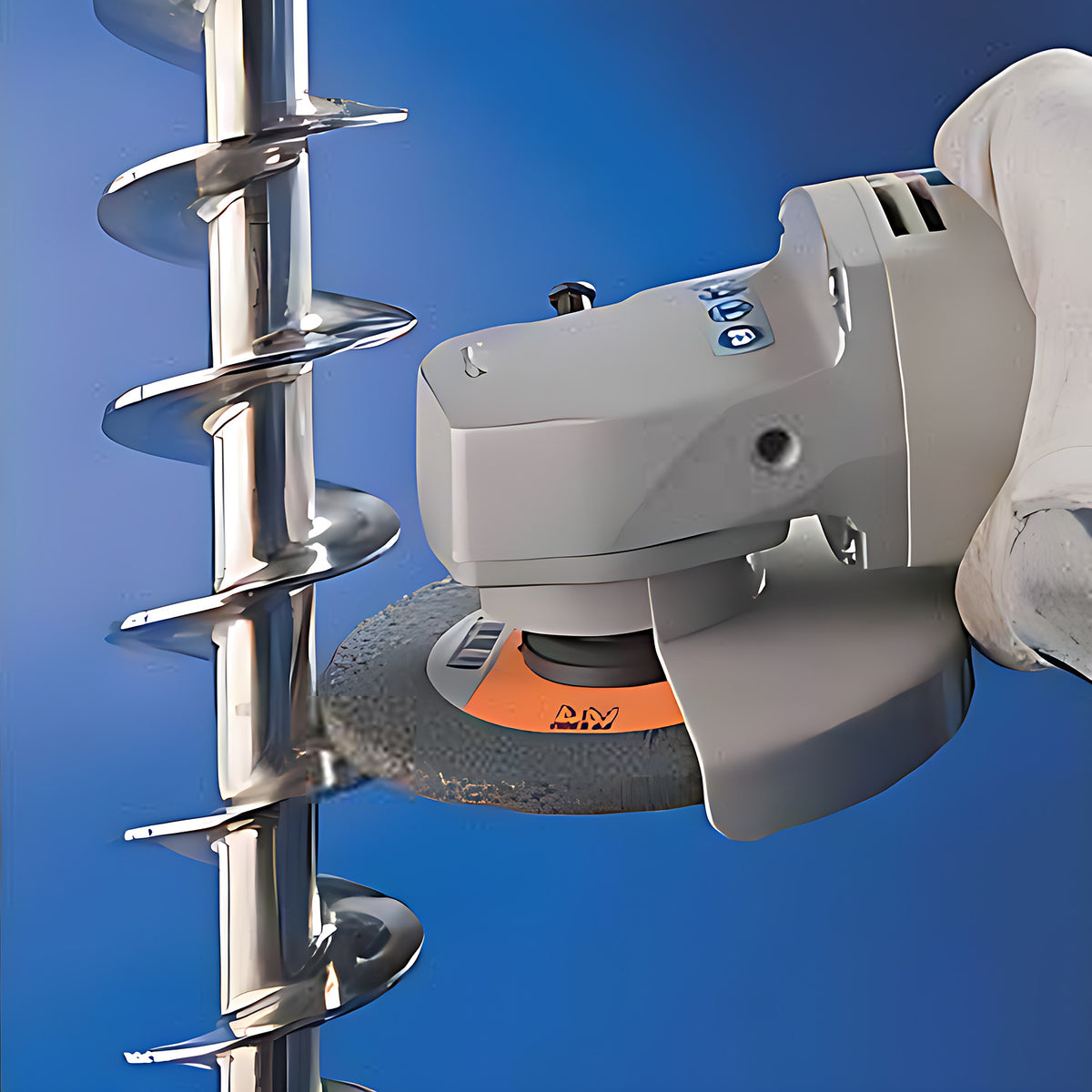 Pferd POLINOX PNER-MH Unitized Wheel, Aluminium Oxide, gloved operator using an angle grinder with a grey unitized wheel on a screw conveyor auger, blue background, PNER-MH listing